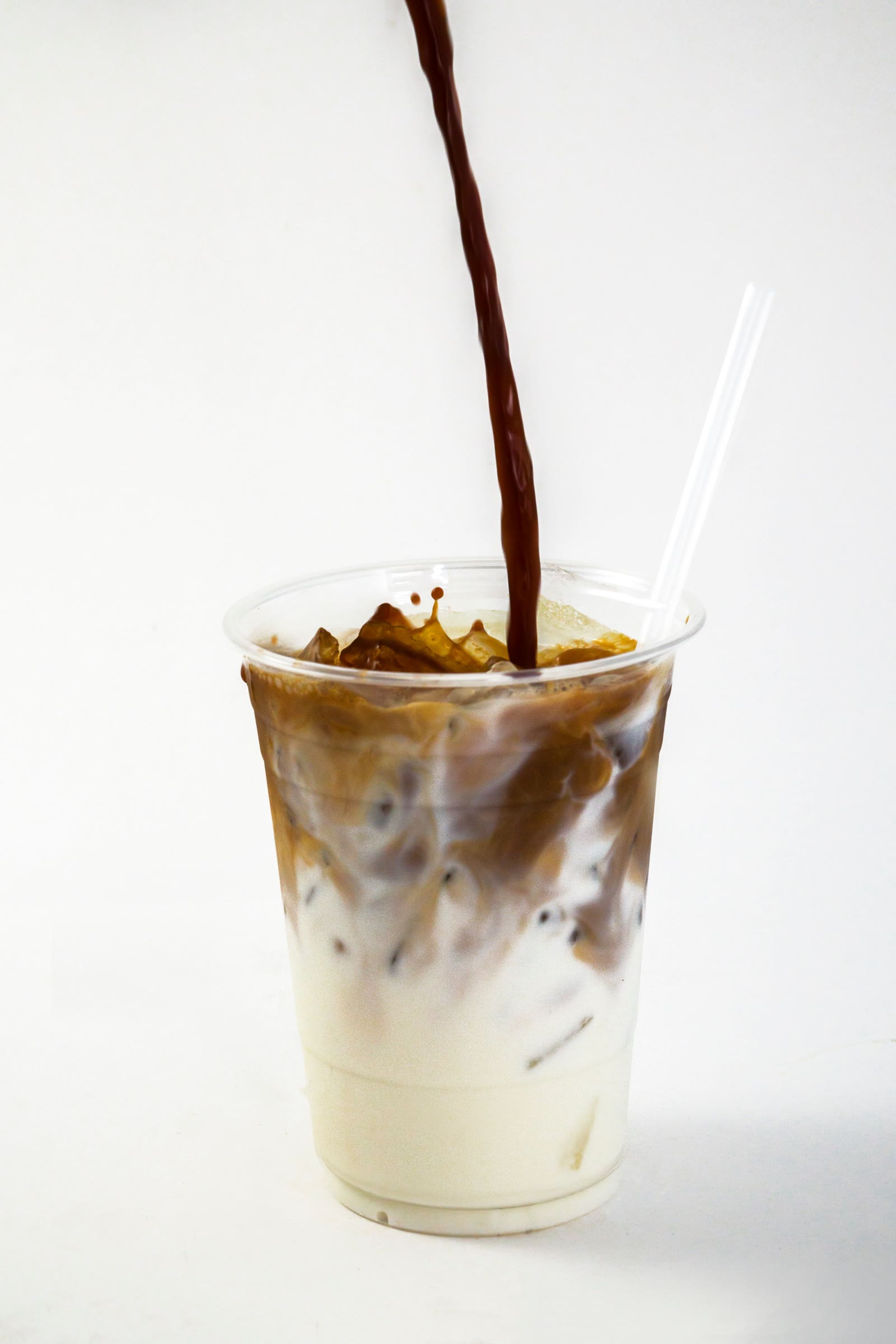 Cold brew poured over milk and ice